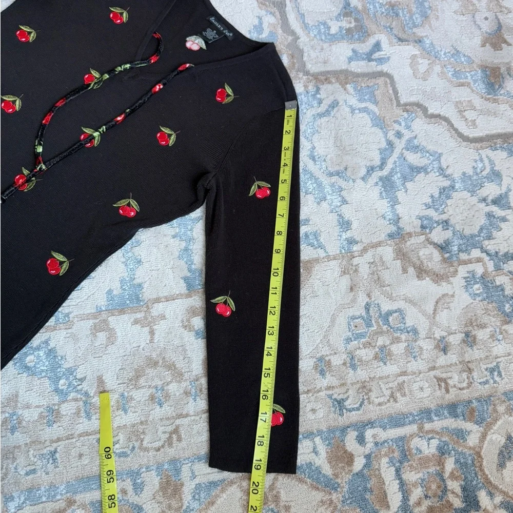 Black long sleeve Y2K vibes top with red cherries and a tie front detail size S
